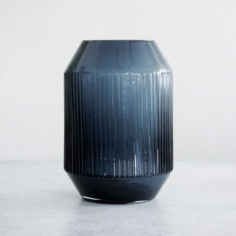 Big glass vase in blue